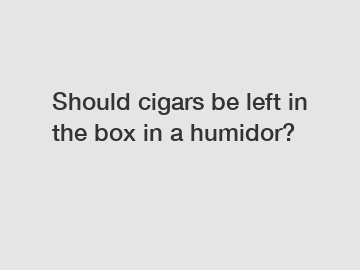 Should cigars be left in the box in a humidor?